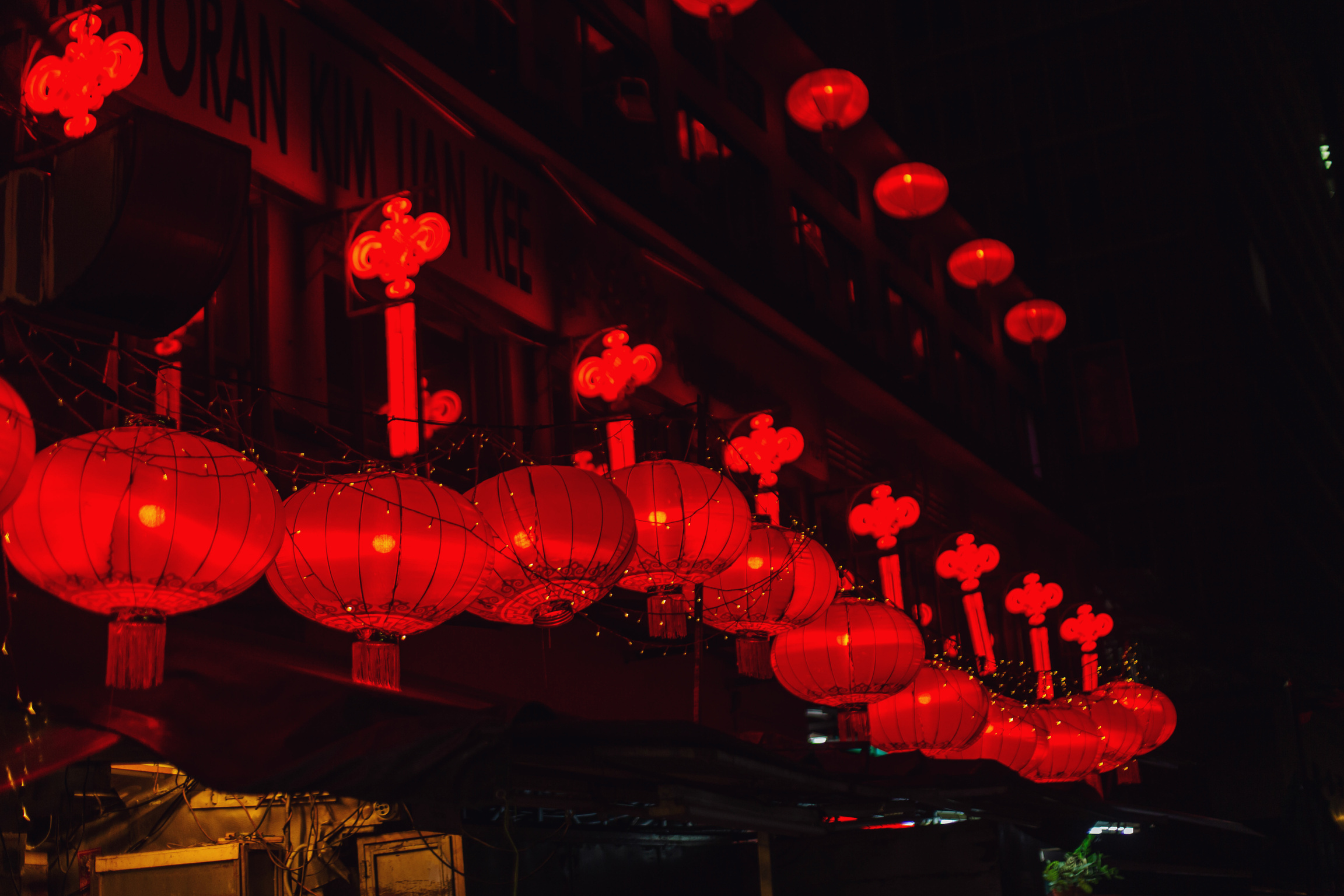 Red Lanterns Hanging Above in Night Market
